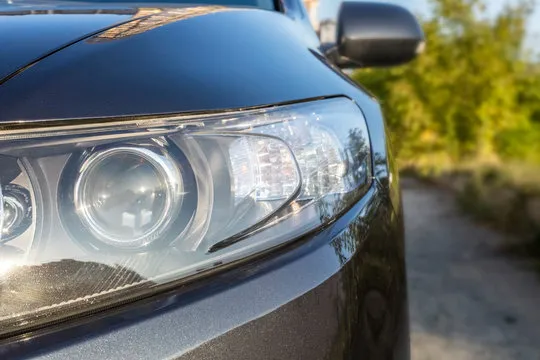 Car headlights. Exterior detail. Copy space