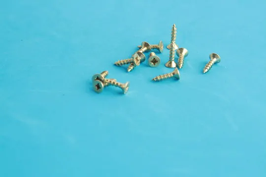 golden star screws, in colorful background