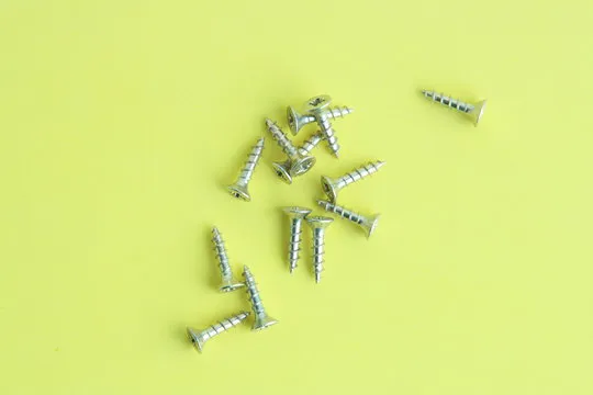 golden star screws, in colorful background