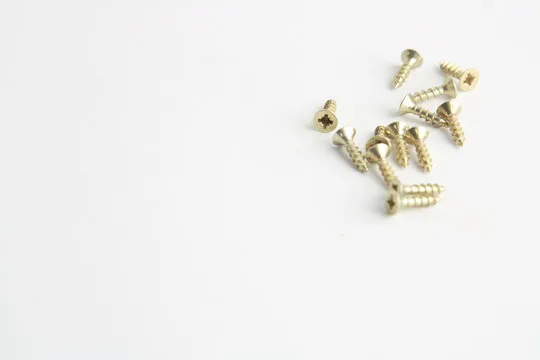 golden star screws, in colorful background