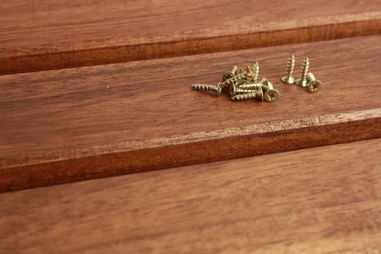 golden star screws, in colorful background