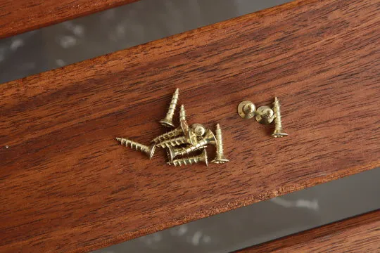 golden star screws, in colorful background