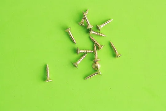 golden star screws, in colorful background