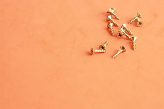golden star screws, in colorful background