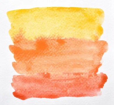a photo image of abstract red orange and yellow watercolor on paper, hand paint of red orange and yellow watercolor gradient for background, wet technique on paper to mix difference color