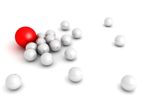 Leadership concept with red sphere and many white ones